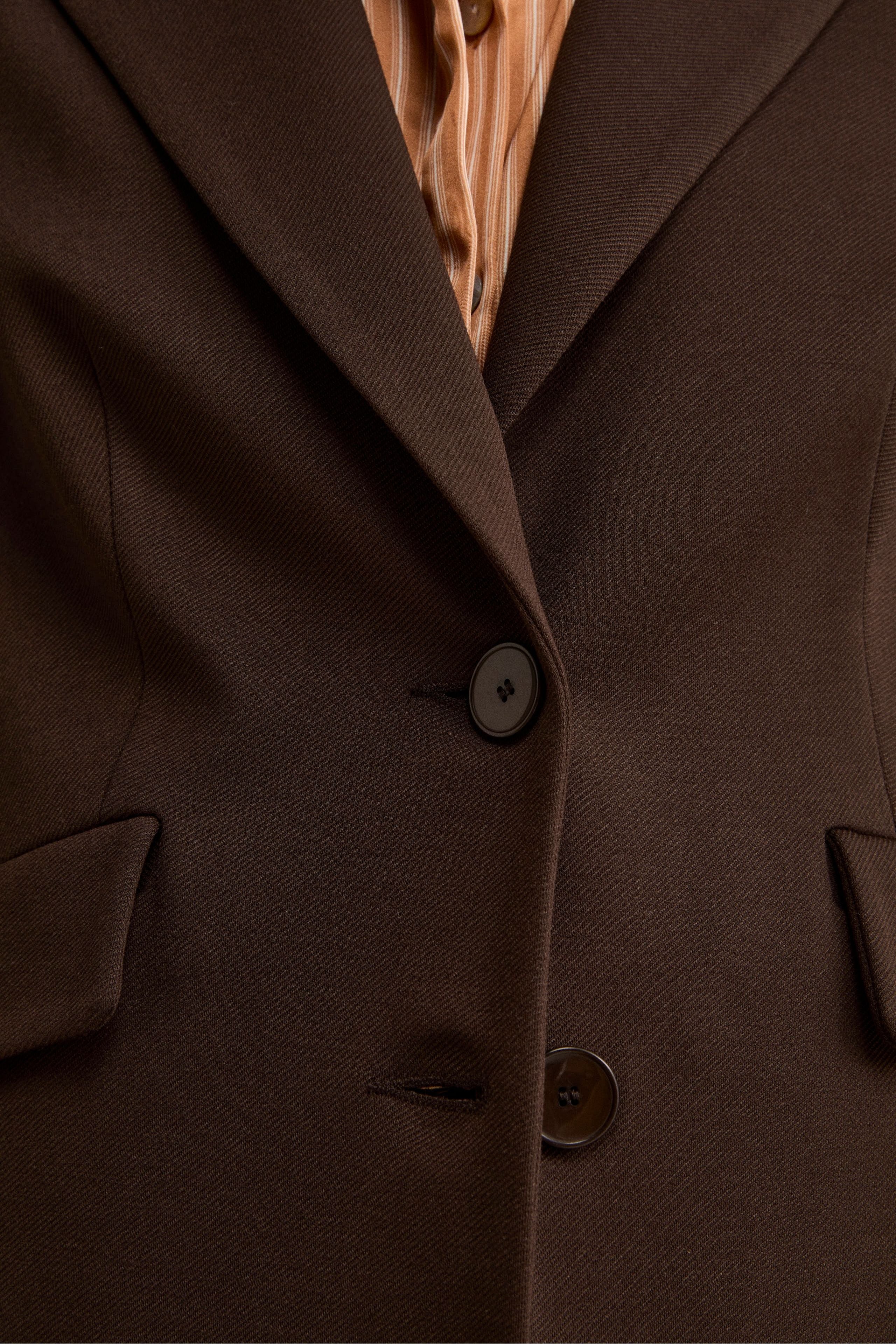 Giacca Lunga Elegante con Revers a Lancia - T.MORO