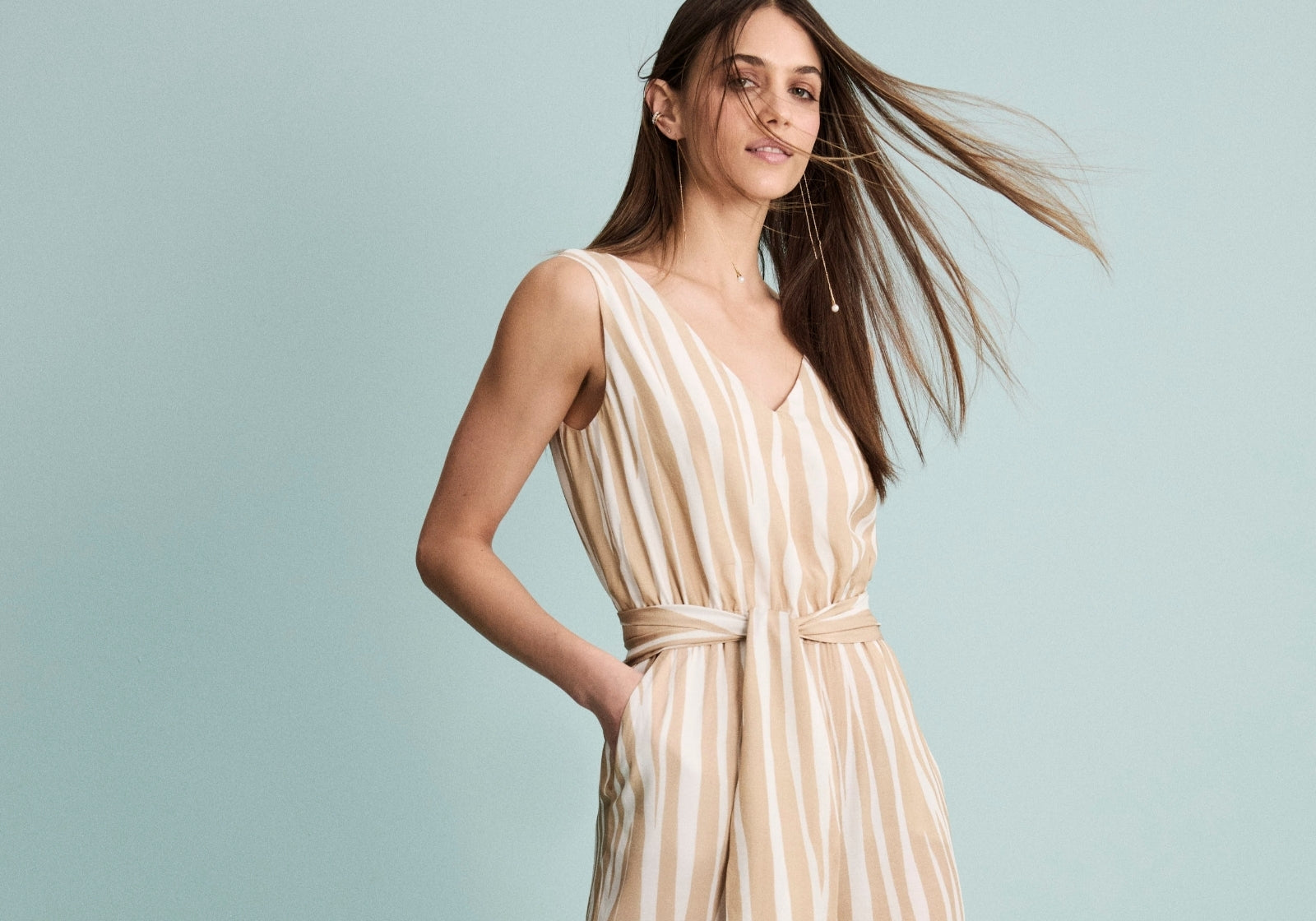 Tuta a righe da donna elegante